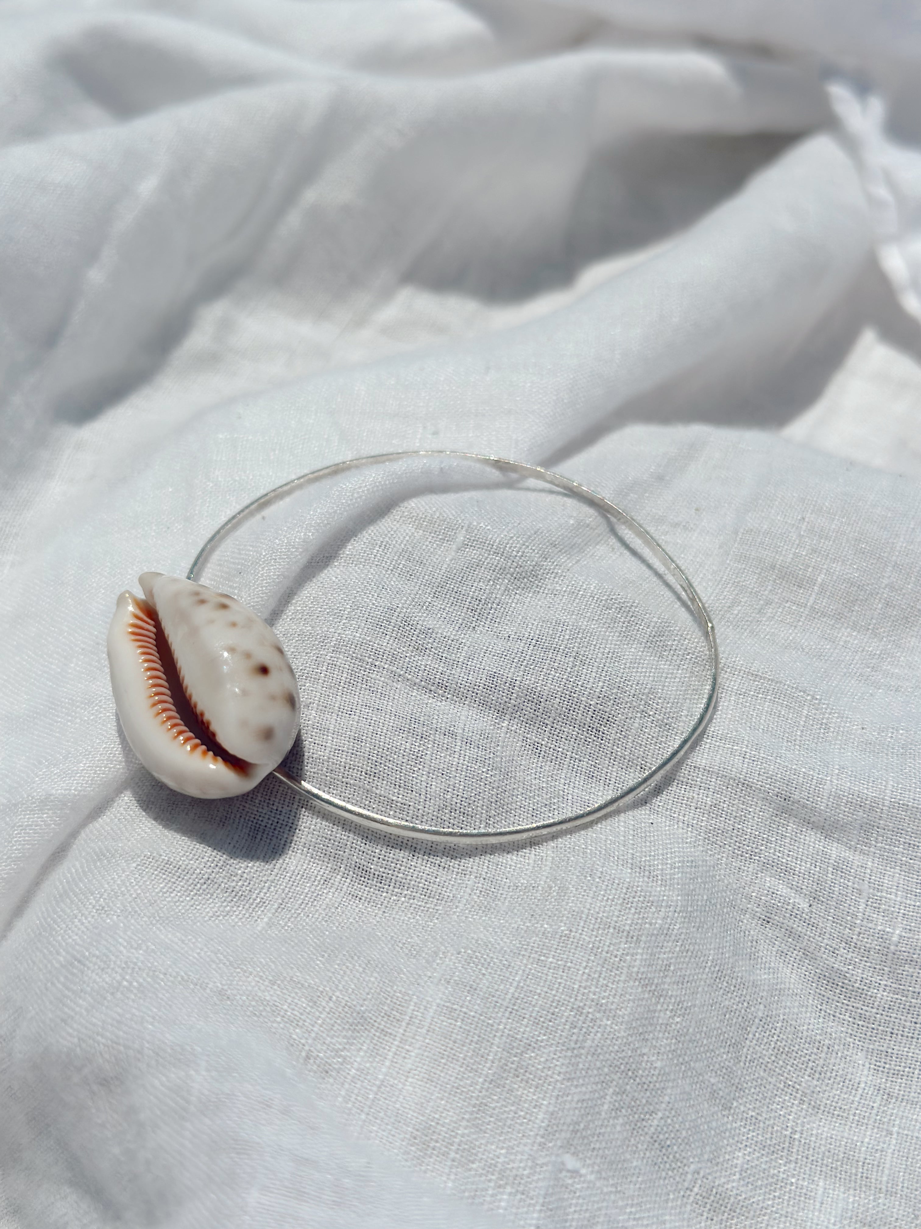 Sterling Silver Bangle with Puka Shell
