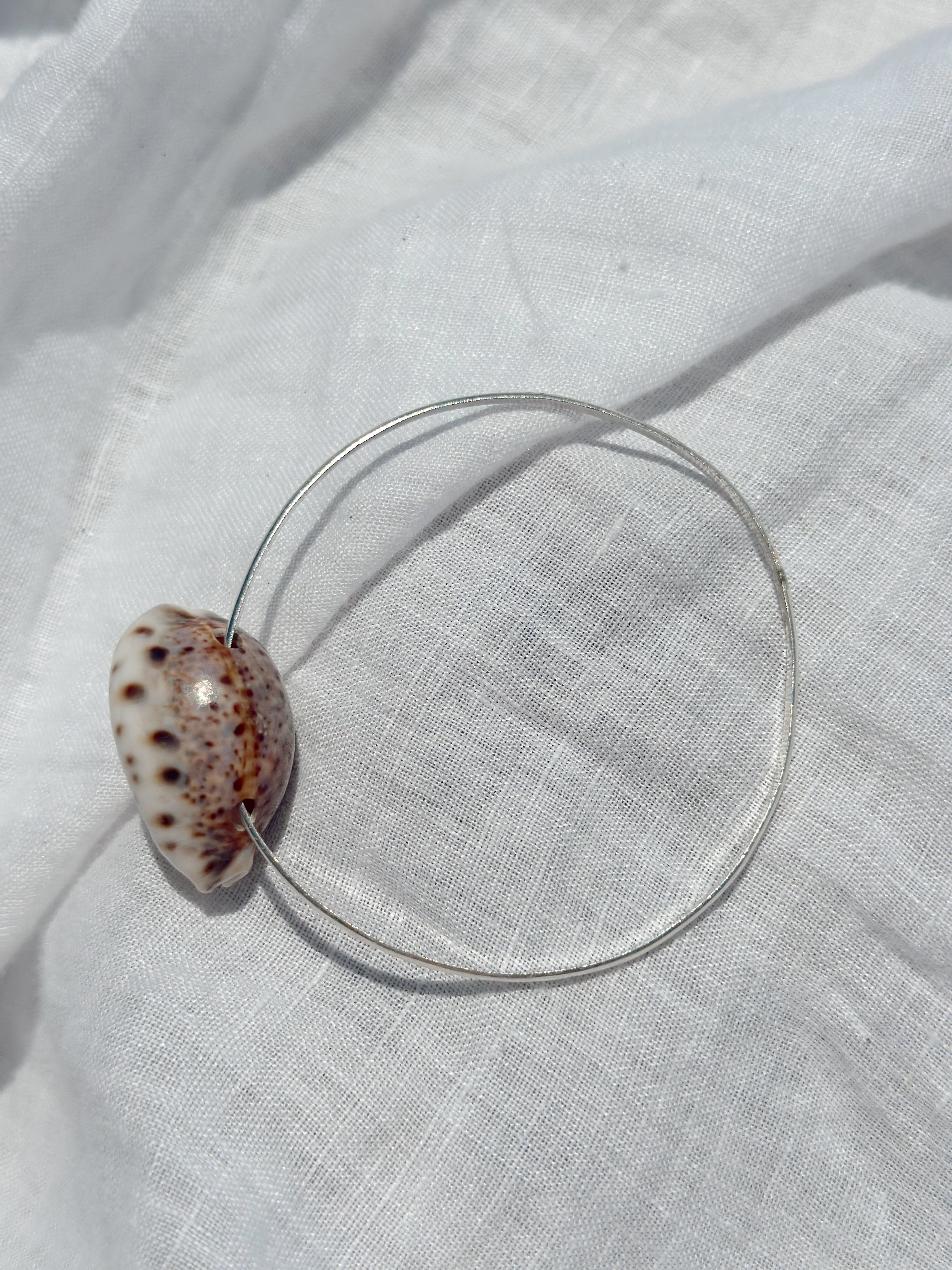 Sterling Silver Bangle with Puka Shell