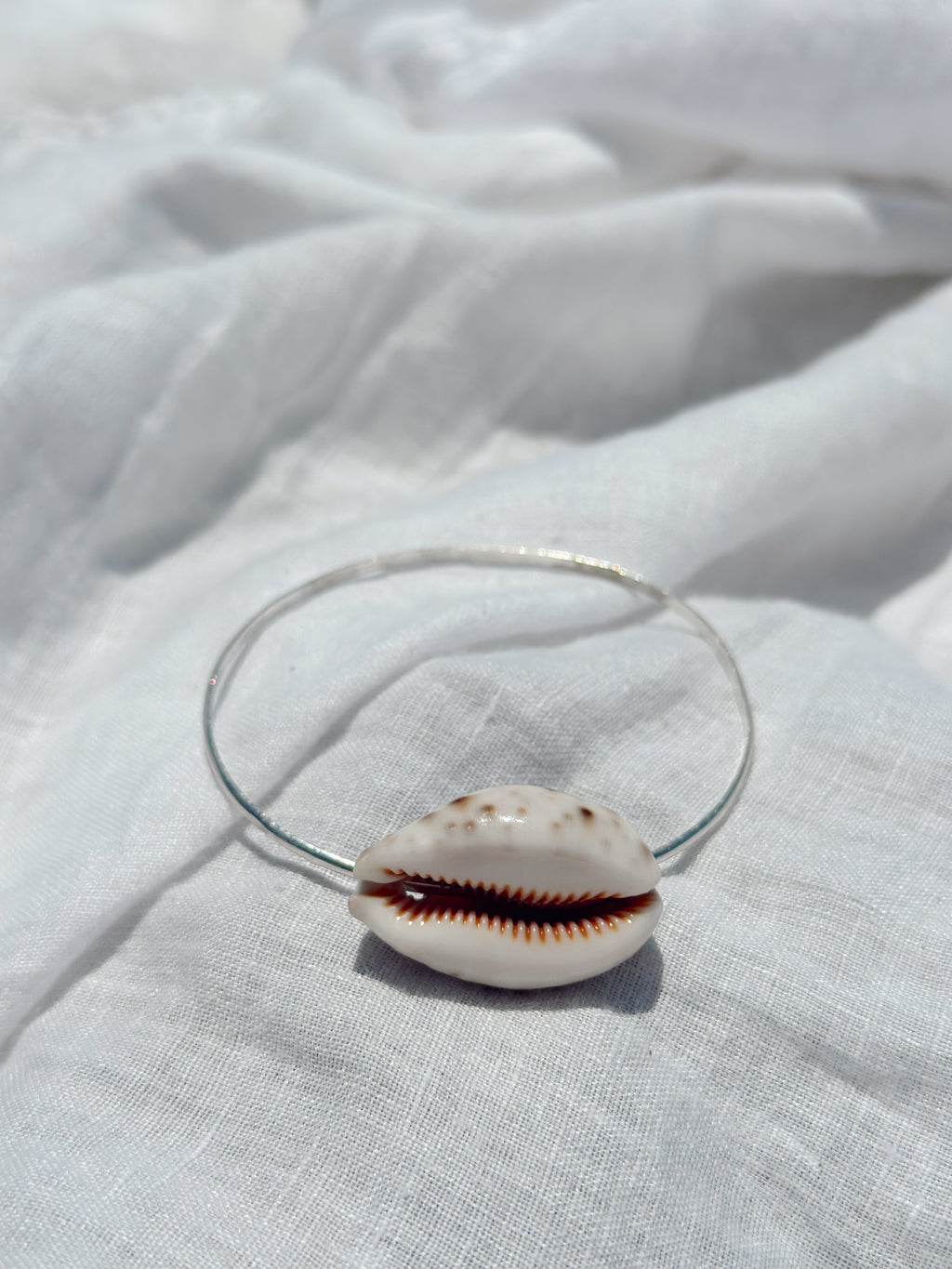 Sterling Silver Bangle with Puka Shell