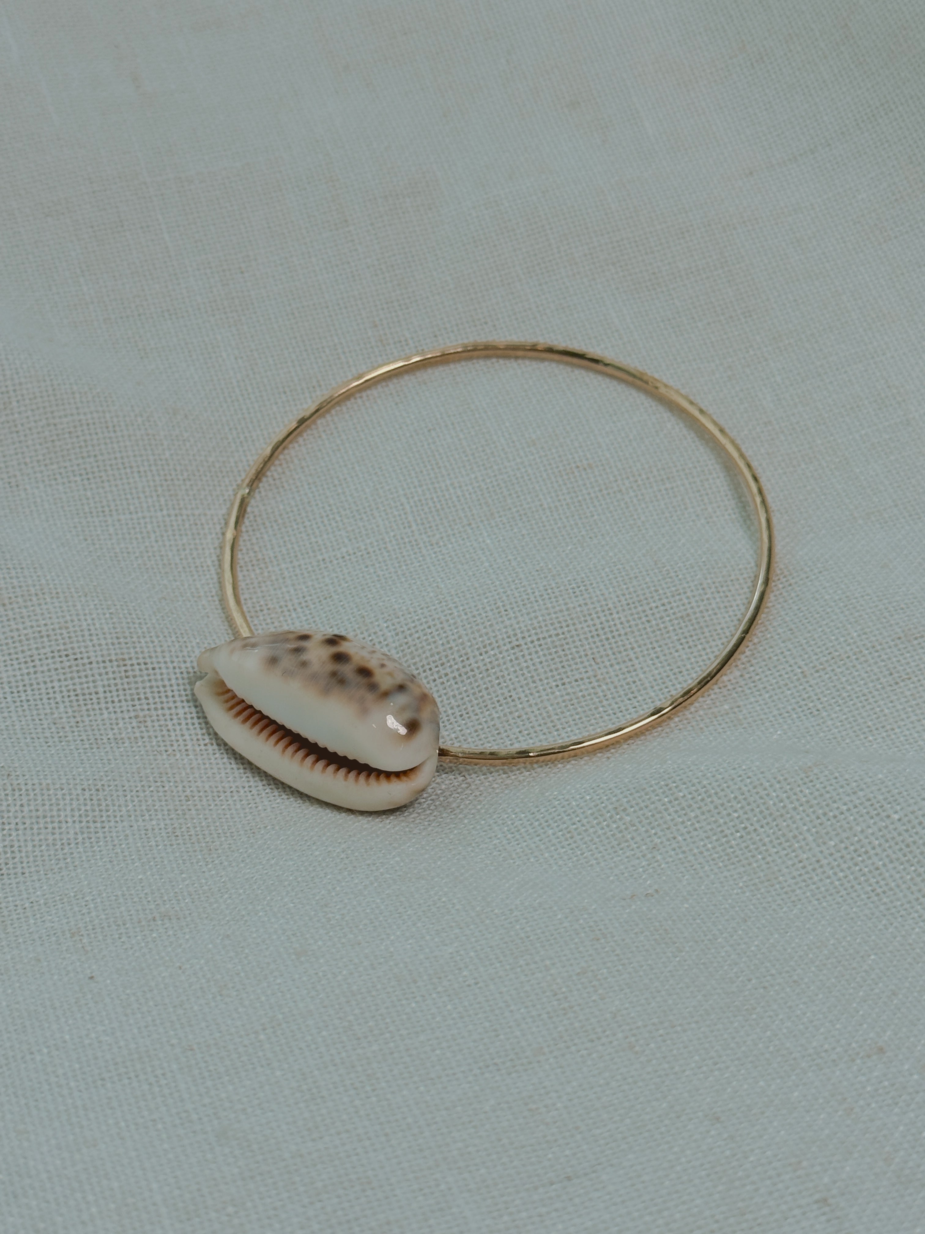 Gold Bangle with Cowrie Shell