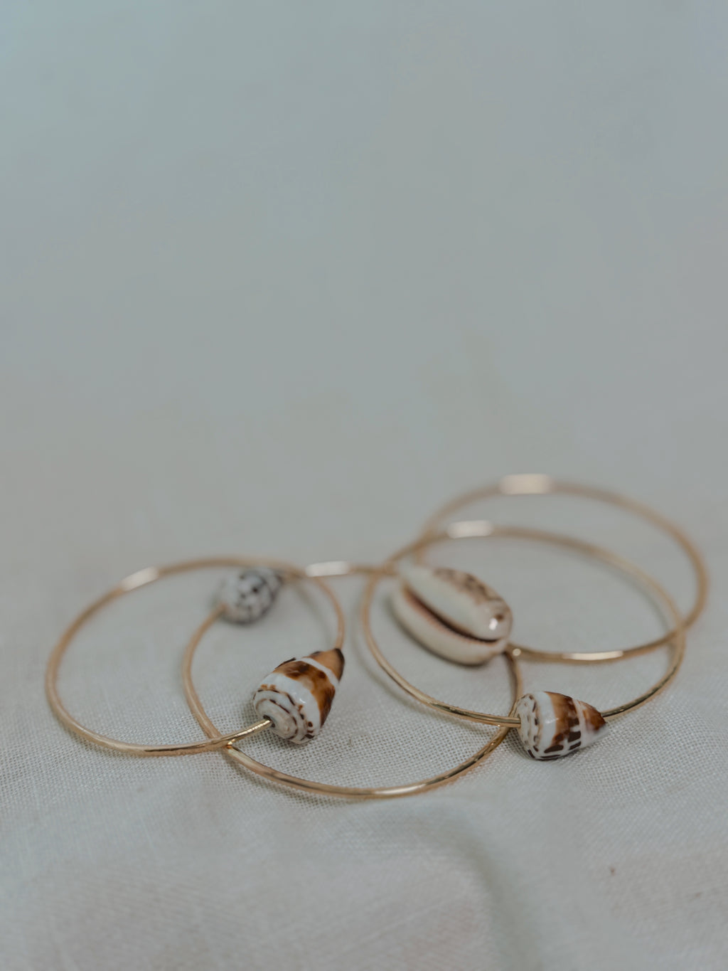 Gold Bangle with Cowrie Shell