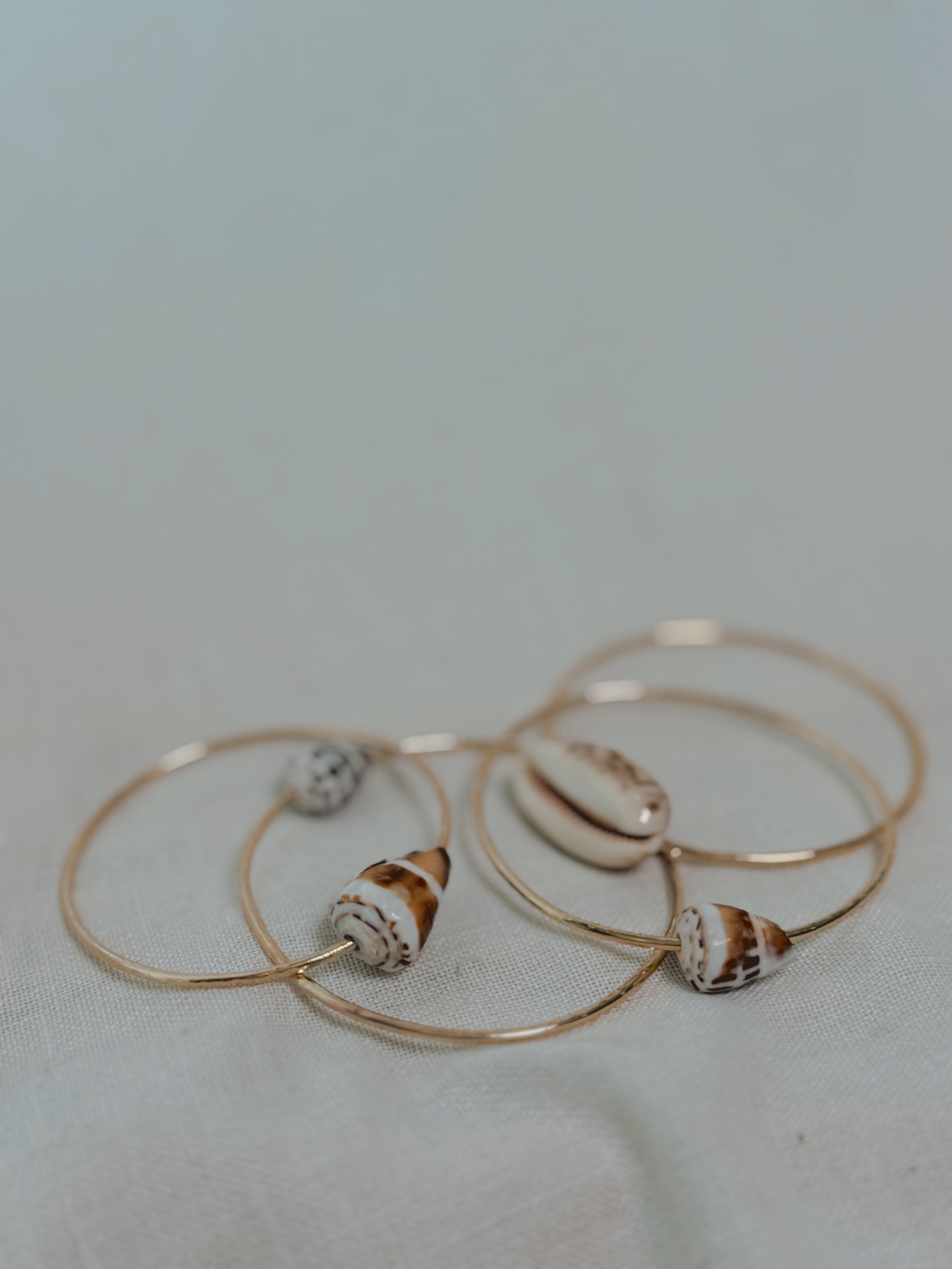 Gold Bangle with Cowrie Shell